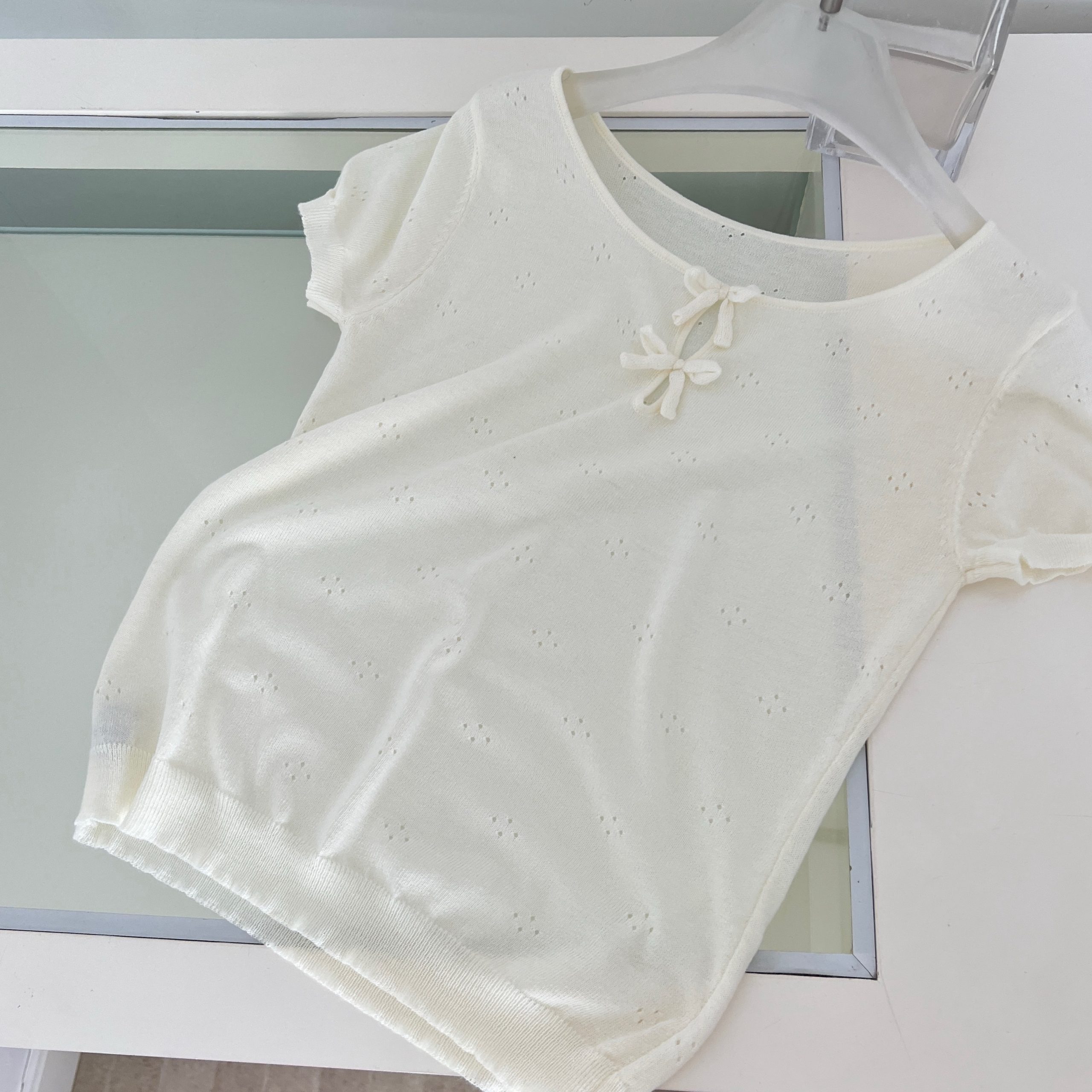 1783235393884_qkL6xd.jpg Lukira Light Summer Round Neck Bow Hollow Jacquard Knit Short Sleeve T-Shirt Women Slimming Top