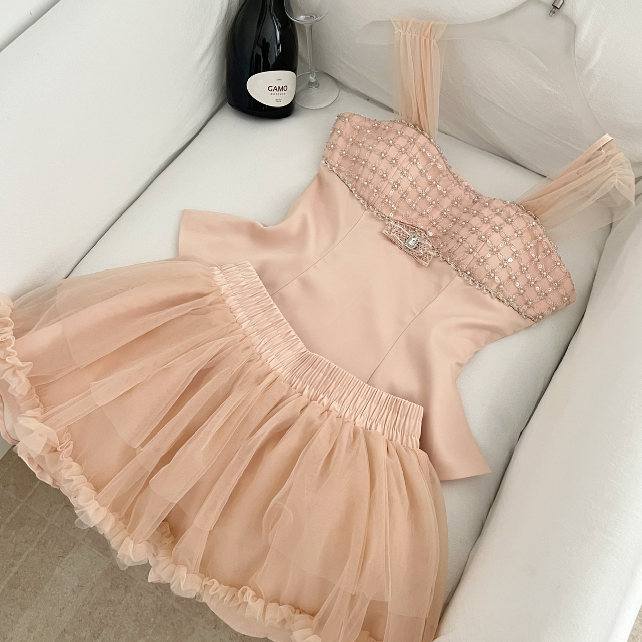 1784511348444_Jk3yhF.jpeg Xiao Nuo One-Shoulder Top Elegant Fairy Suspender Cream High-Waist Puffy Skirt Set